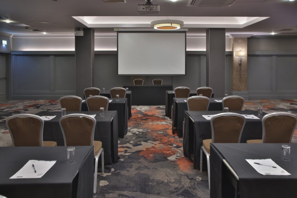 A meeting room arranged in classroom style for delegates at La Royale, Cricklewood