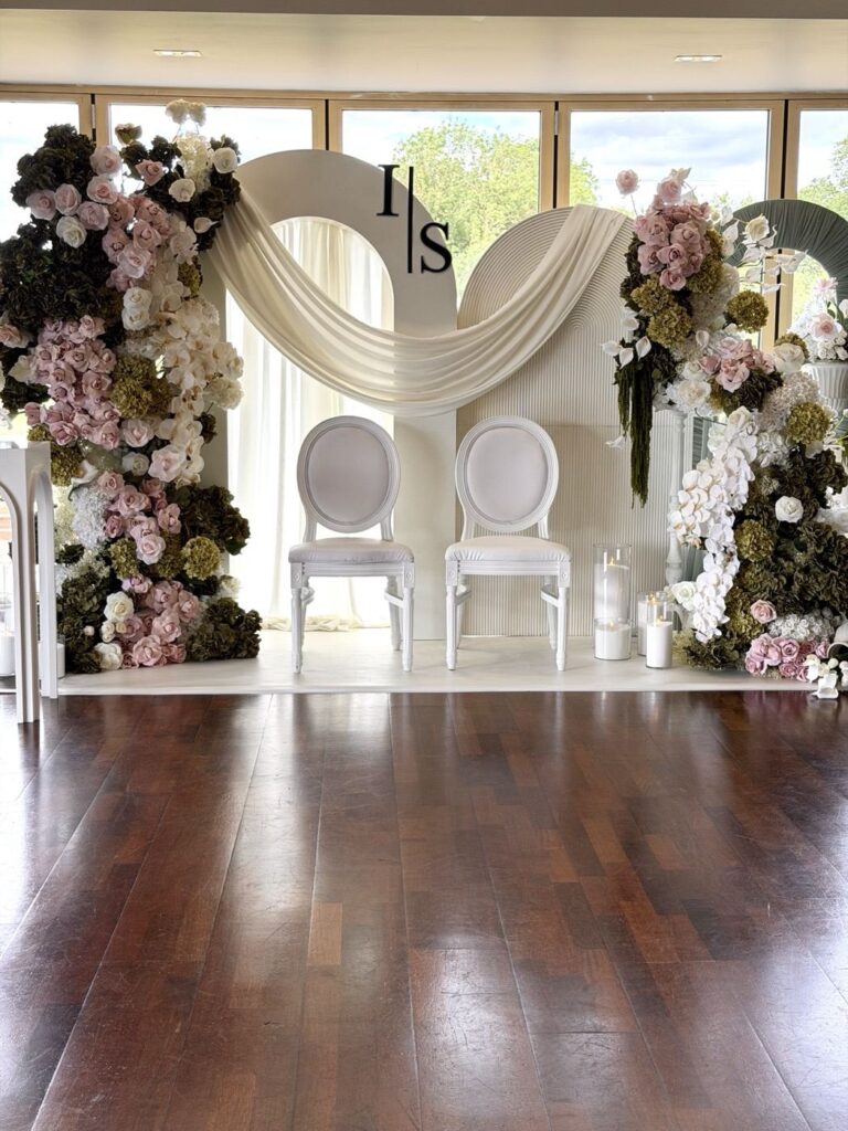 Ceremony backdrop with monogram, Salisbury Suite
