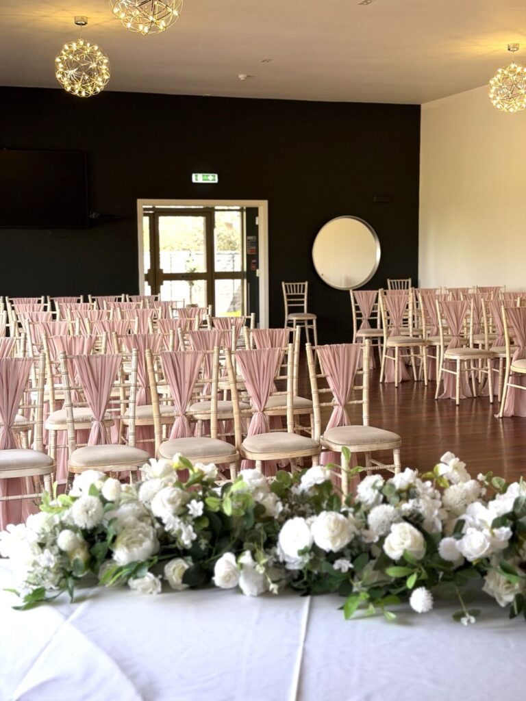 Ceremony room dressed with floral displays, Mill Green