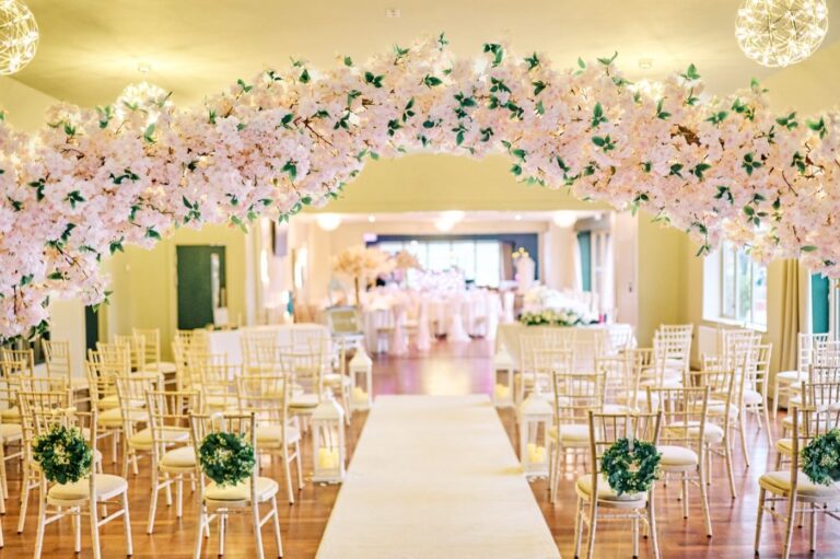 Ceremony styled with cherry blossom trees, Mill Green