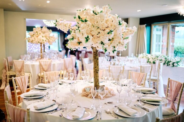 Reception tablescape with cherry blossom centrepiece