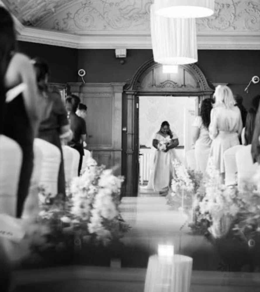 A bride arriving for her ceremony at La Royale, Cricklewood